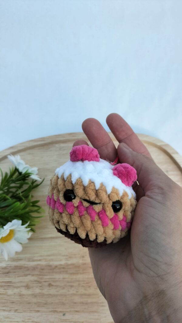 oplus_34 Sleutelhanger cupcake - donker roze